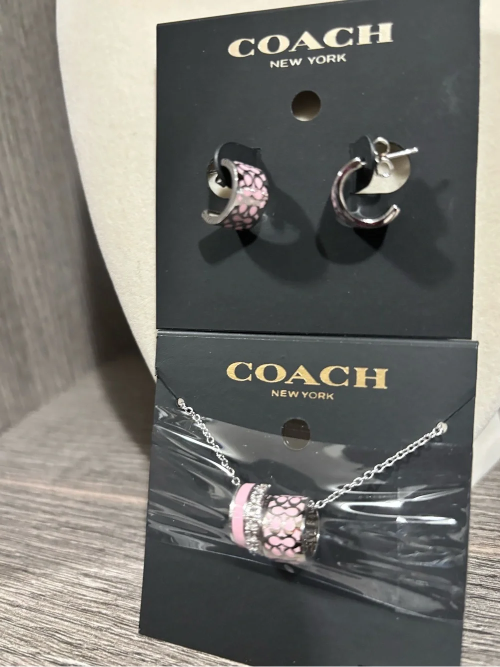 NWT Coach Signature Huggie Cuff earrings and a matching pendant necklace